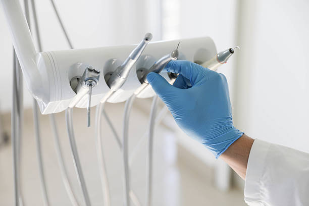 Professional Tooth Extraction technician working in Channahon, IL